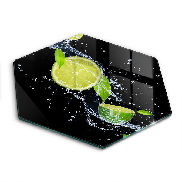 Tocător din sticlă hexagonal Lime zemoase în apă