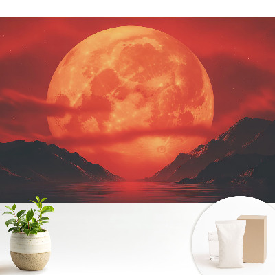 Luna peste munți în culori intense