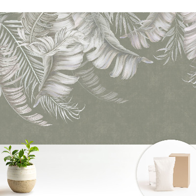 Frunze tropicale subtile pe un fundal gri