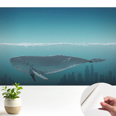 Balena și orașul la apus