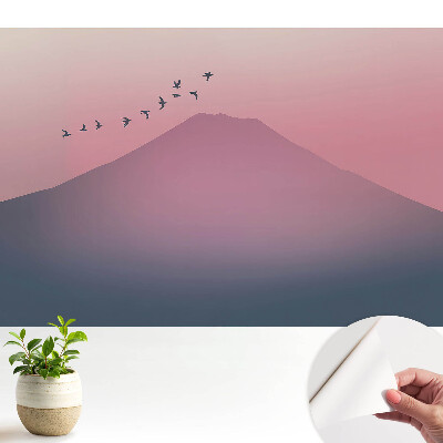 Munți pastelați la apus