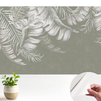 Frunze tropicale subtile pe fundal gri