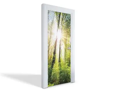 Autocolant pentru uși Razele soarelui în pădure