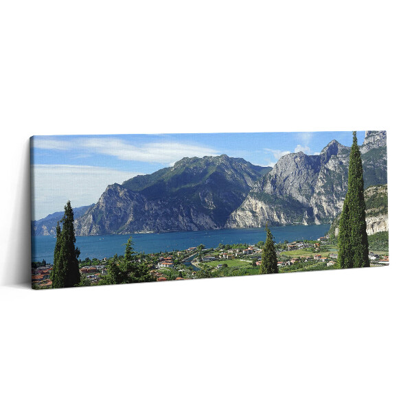 Print pe canvas 125x50 Copaci verzi în fața orașului