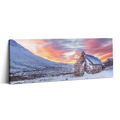 Print pe canvas 125x50 O căsuță în munții înzăpeziți