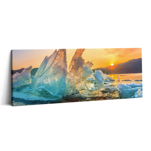 Print pe canvas 125x50 O bucată de gheață la răsăritul soarelui