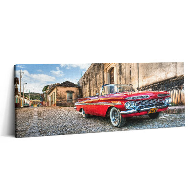 Print pe canvas 125x50 Mașină roșie veche în cartierul columbian