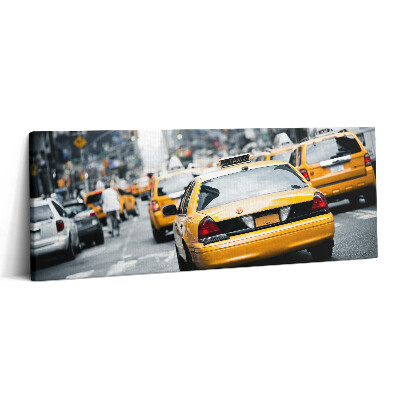 Print pe canvas 125x50 Taxiurile din New York City într-un ambuteiaj urban