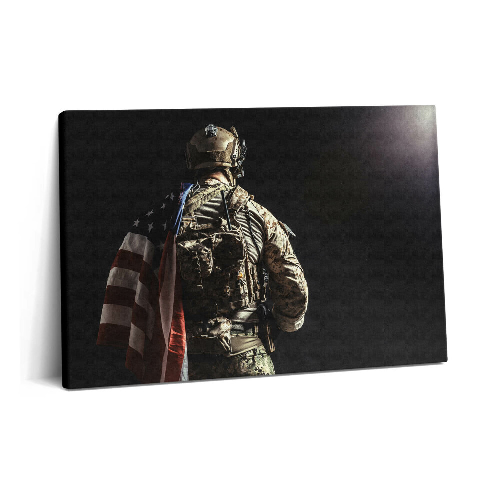 Tablou pe pânză 60x40 Soldat cu un steag