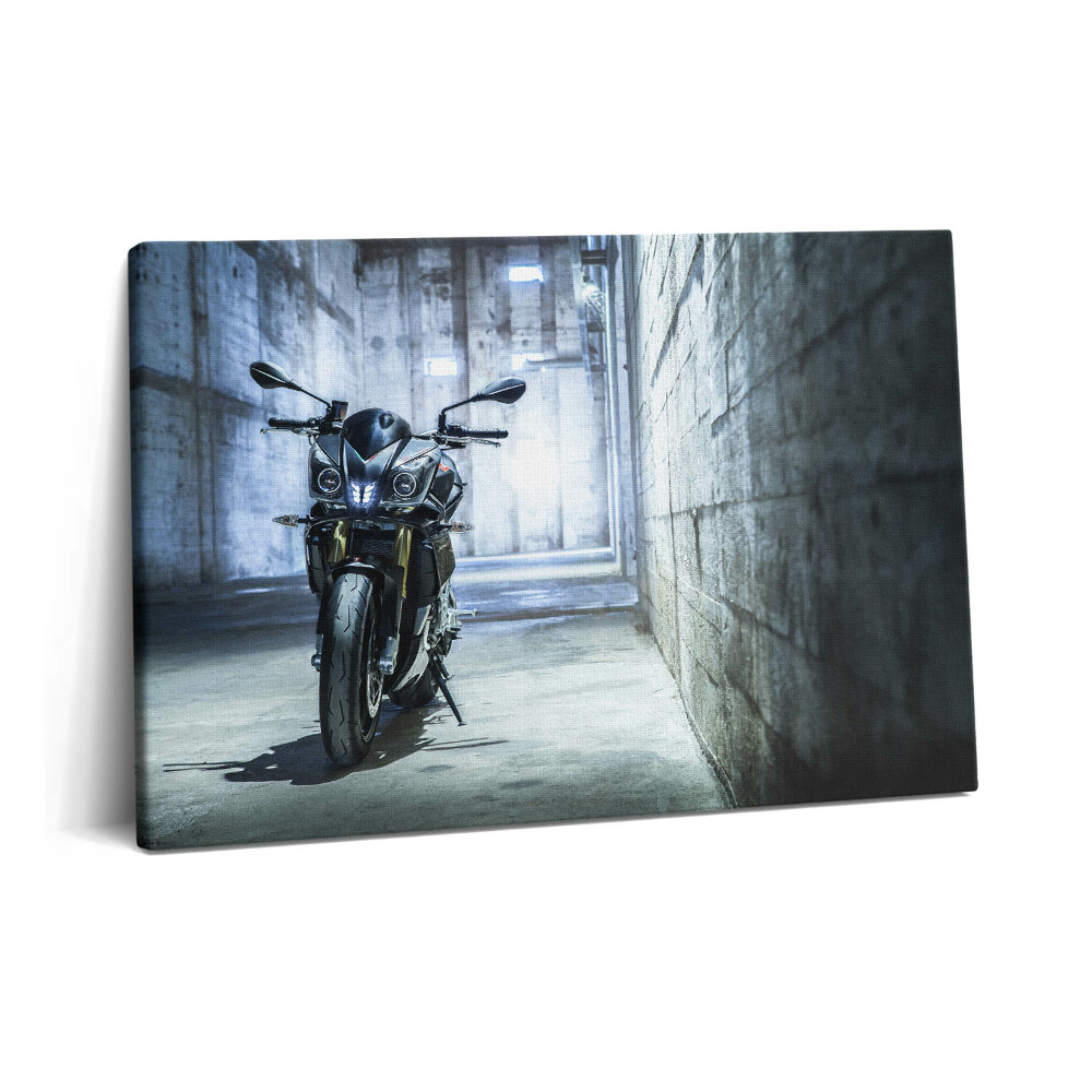 Tablou pe pânză 60x40 O motocicletă pe o bandă betonată a orașului