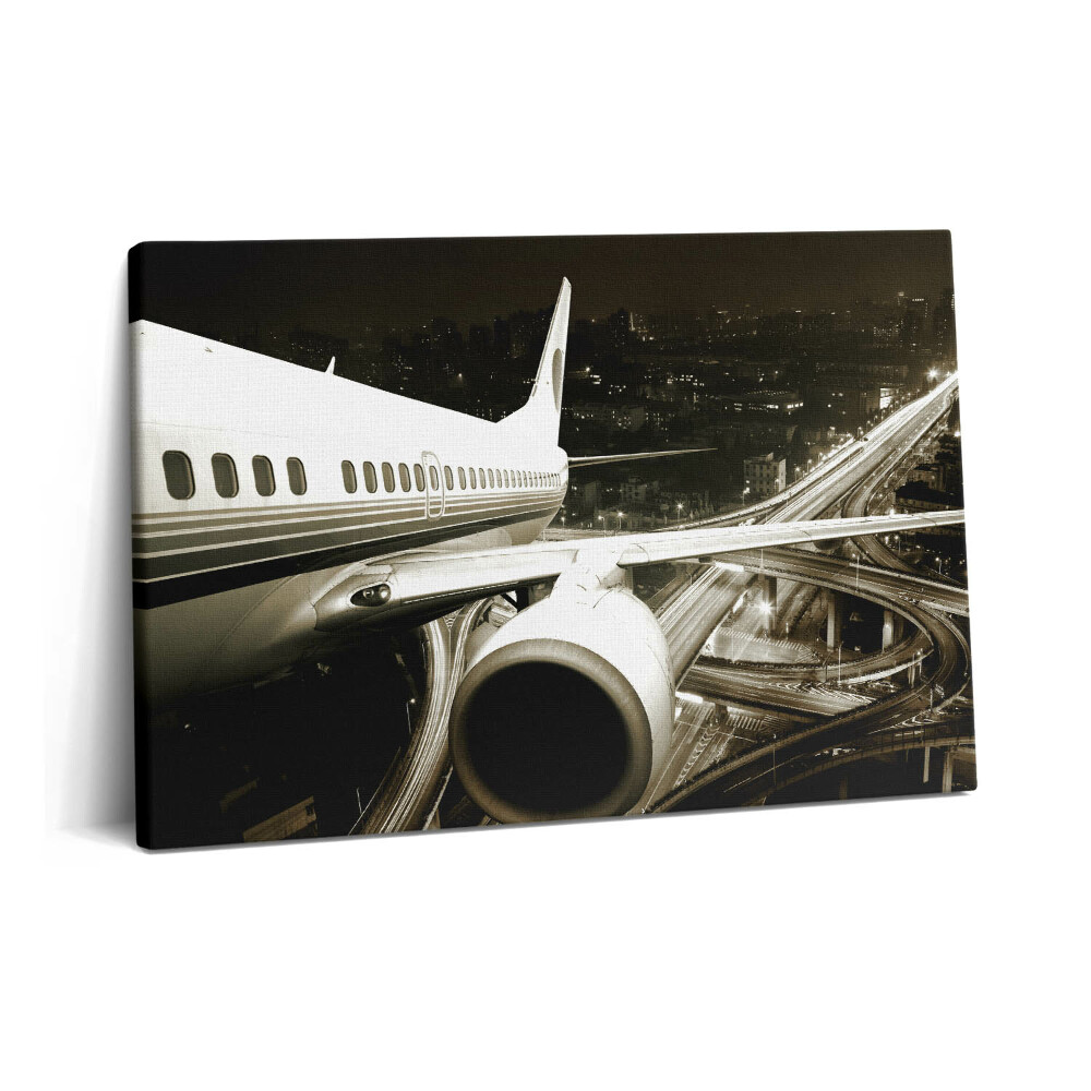 Tablou pe pânză 60x40 Avionul și orașul