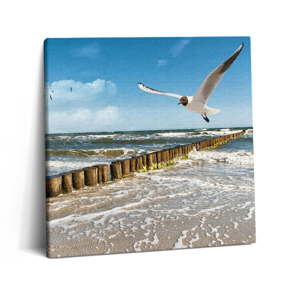 Tablou pe pânză canvas 60x60 O pasăre peste mare