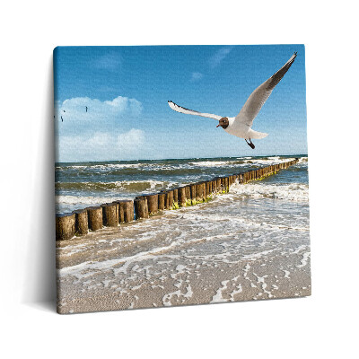 Tablou pe pânză canvas 60x60 O pasăre peste mare