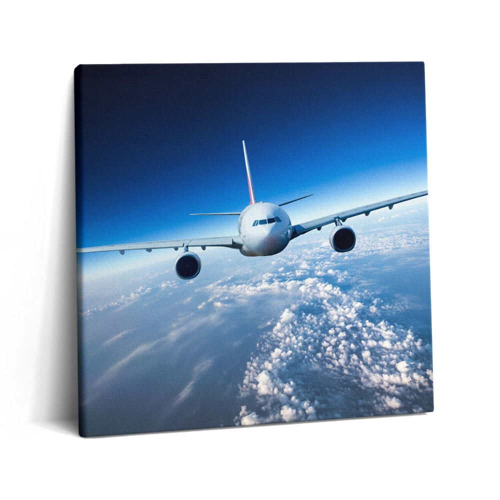 Tablou pe pânză canvas 60x60 Avion deasupra norilor