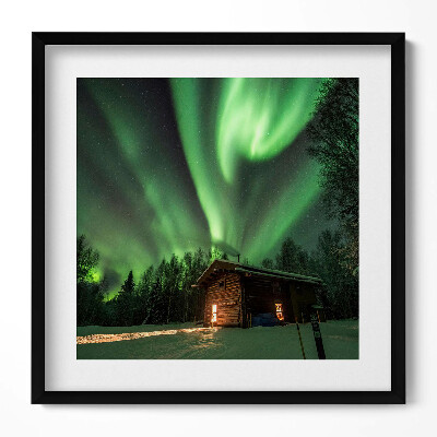 Tablou rama unic Aurora boreală și o căsuță în pădure
