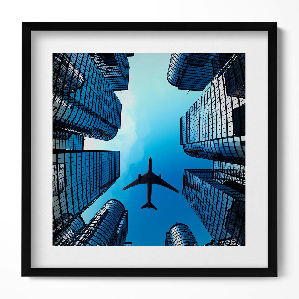Tablou living cu rama unic Avion deasupra clădirilor