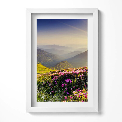 Tablou living cu rama decorativ Munți și o pajiște cu flori