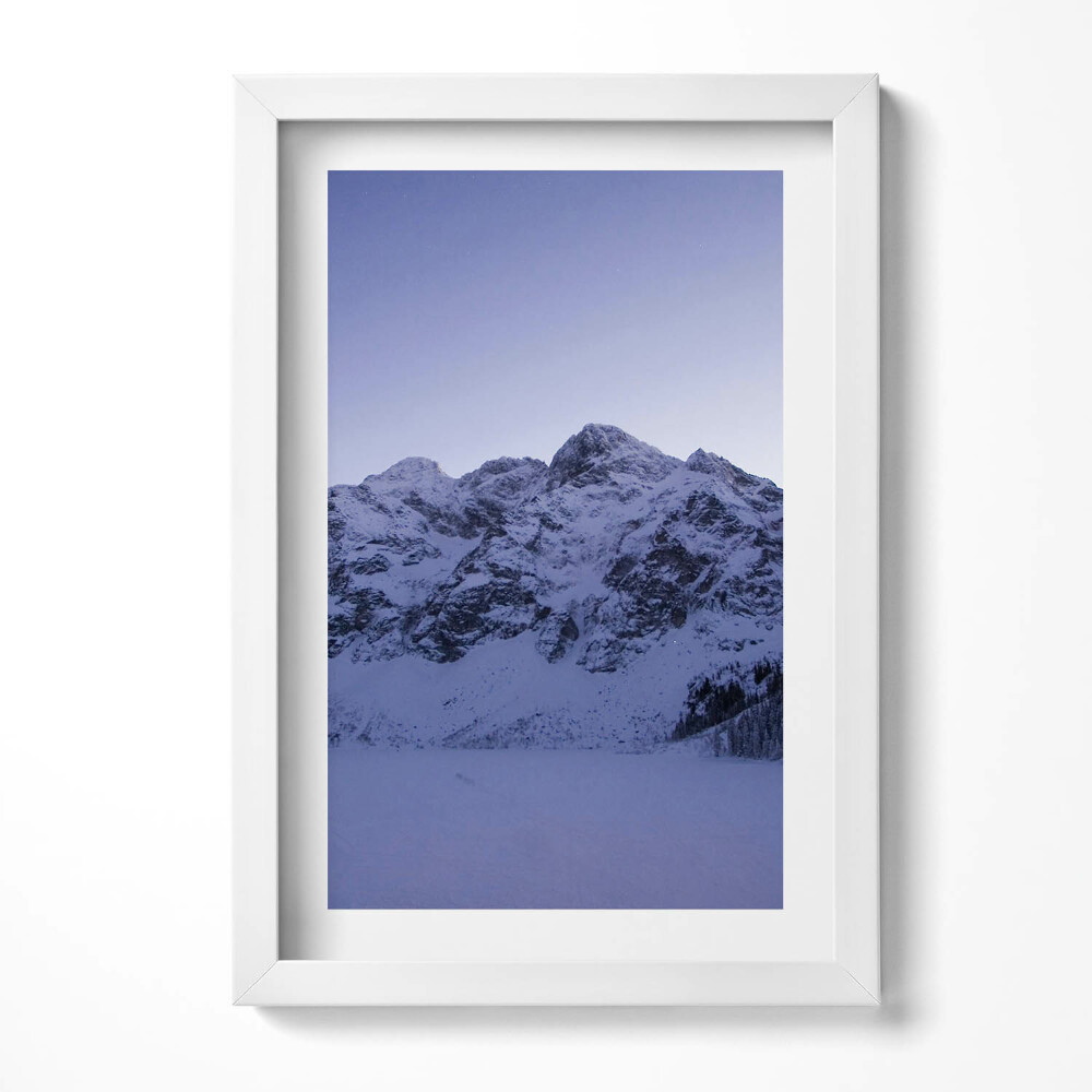 Tablou rama decorativ Peisaj al munților acoperiți de zăpadă