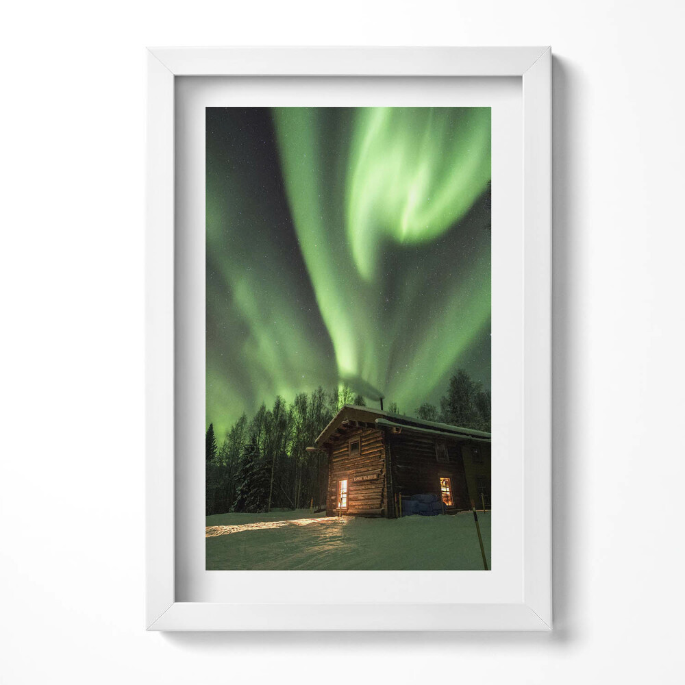 Tablou rama decorativ Aurora boreală și o căsuță în pădure