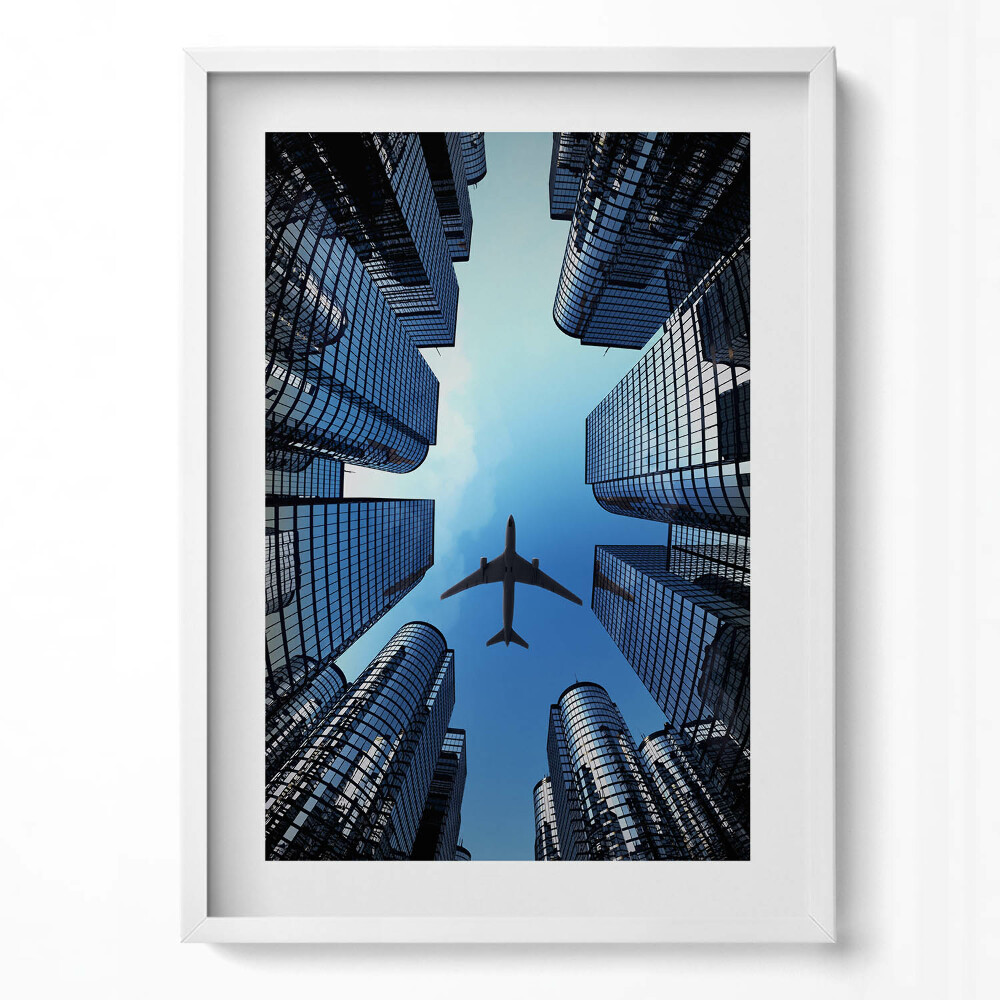 Tablou rama modern Avion deasupra clădirilor