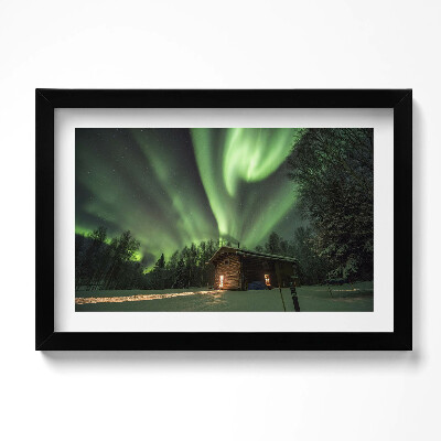 Tablou living cu rama original Aurora boreală și o căsuță în pădure