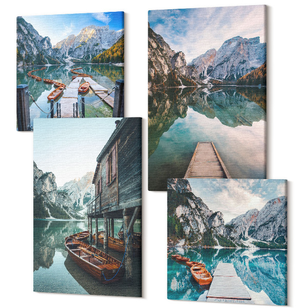 Tablou 4 piese Un lac linistit in munti cu barci de lemn