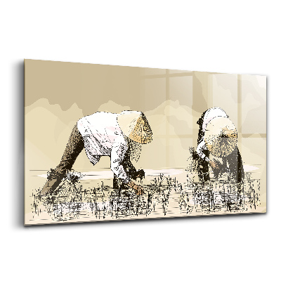 Tablou pe sticlă Două femei recoltează orez în Asia