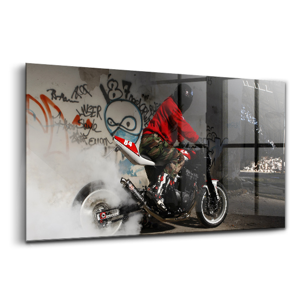 Tablou de sticlă Bărbat pe motocicletă și graffiti