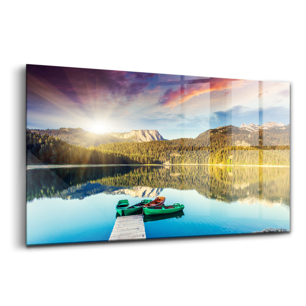 Tablou pe sticlă Peisaj al unui râu cu un fundal de vârfuri de copaci