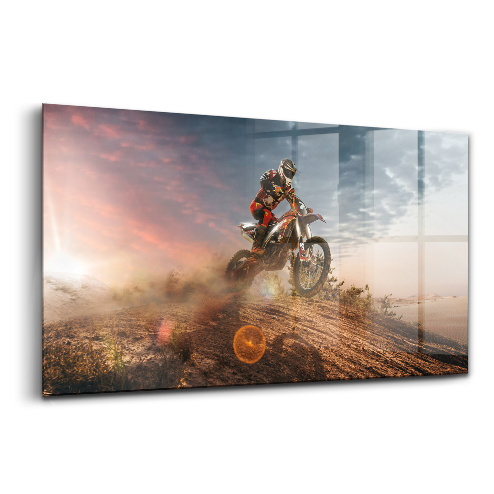 Tablou de sticlă Bărbat pe motocicletă în deșert
