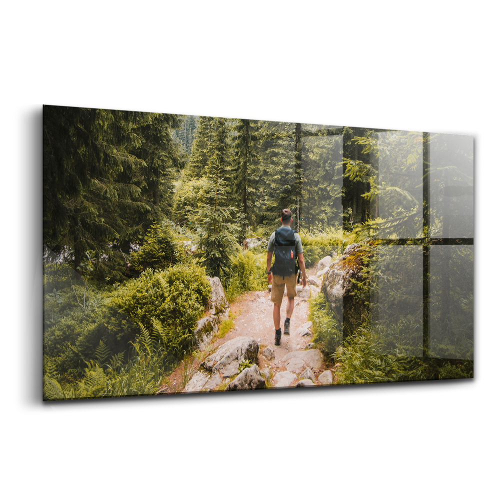 Tablou pe sticlă Un bărbat pe urme în Zakopane