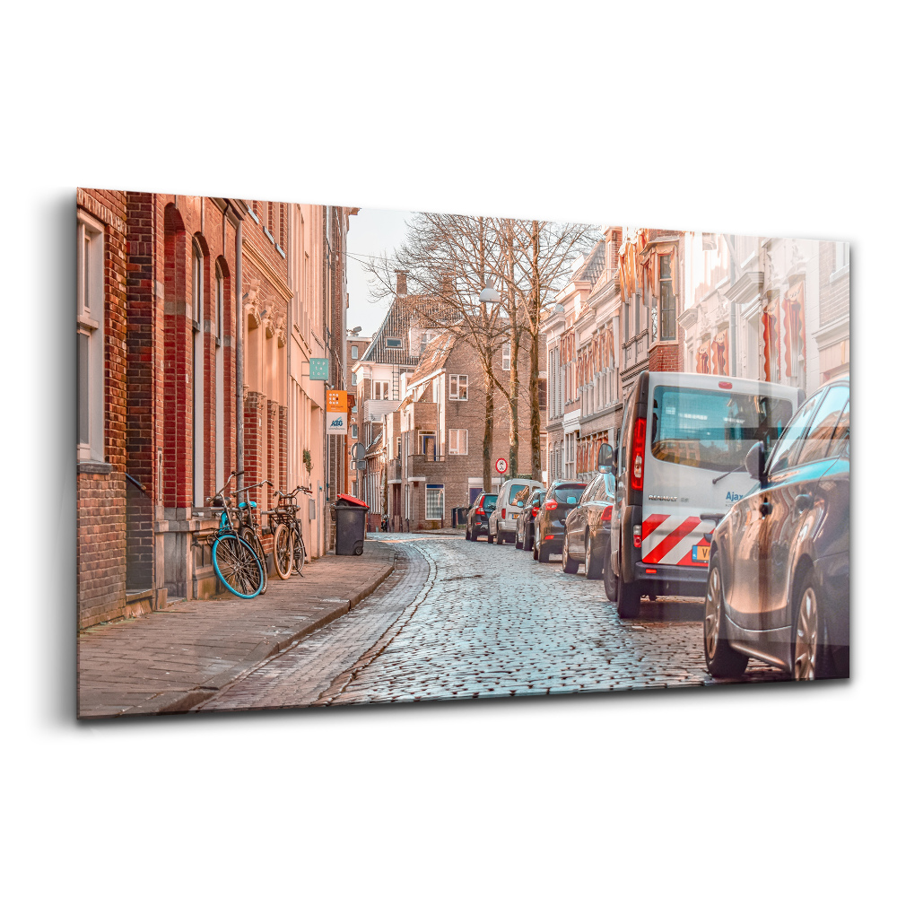 Tablou pe sticlă O stradă din oraș