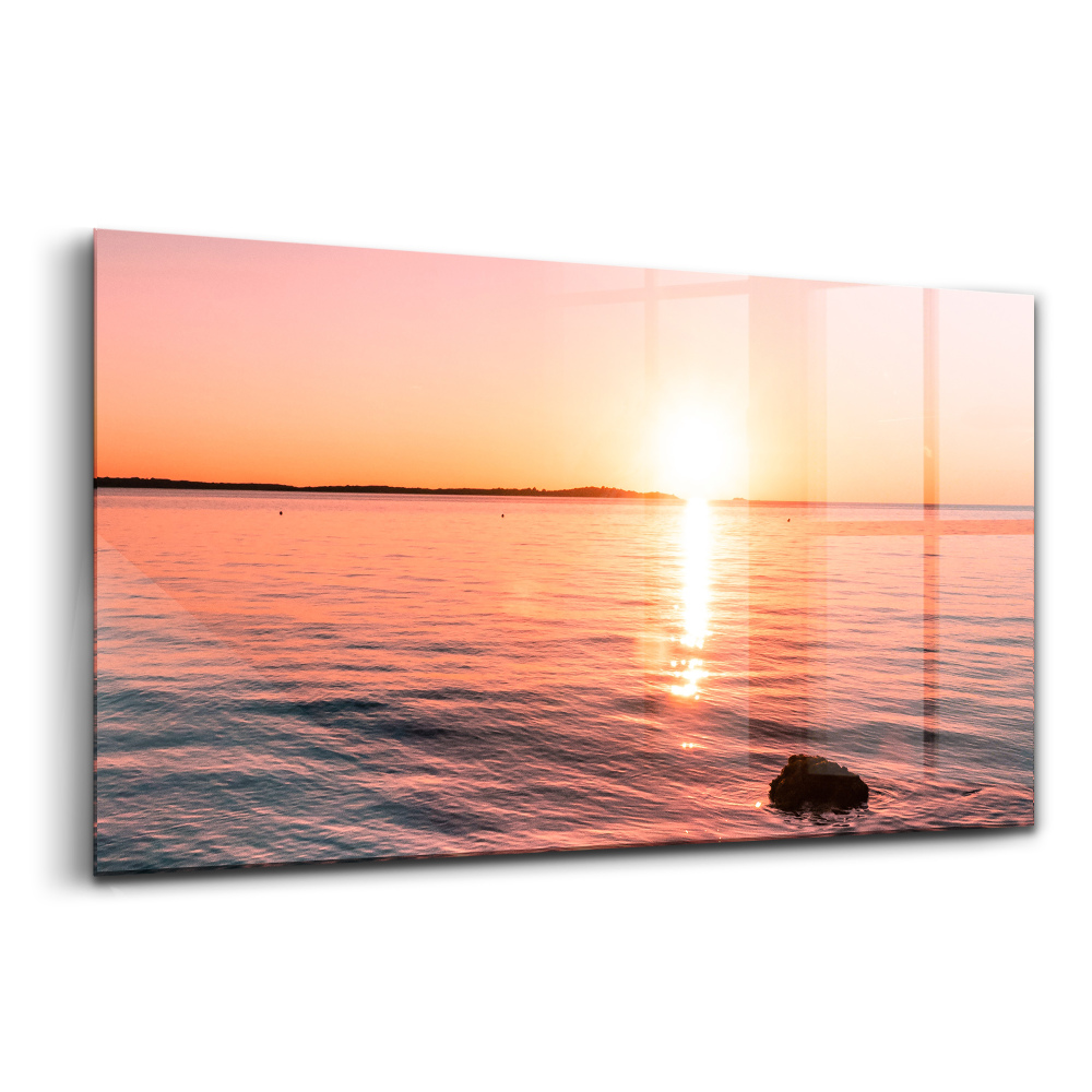 Tablou pe sticlă Stânci la apus