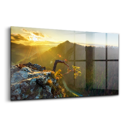 Tablou sticlă Apus de soare peste munți