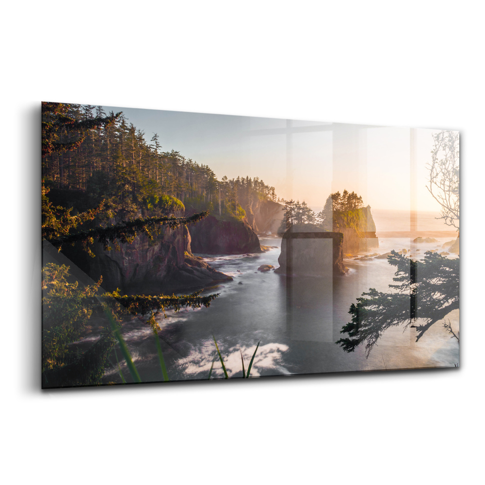 Tablou sticlă Peisaj stâncos apus de soare